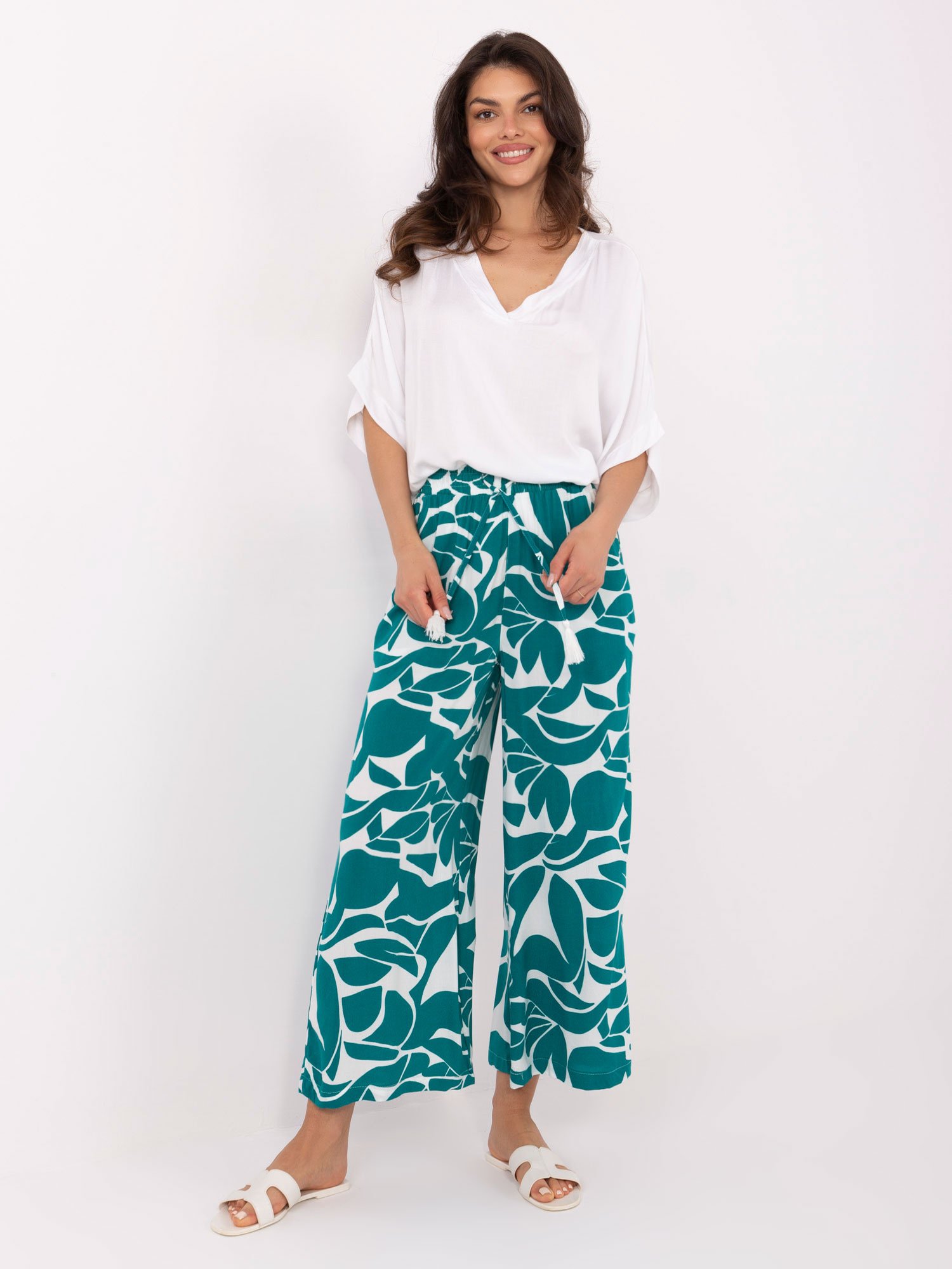 Green summer trousers with print