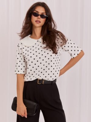 White elegant polka dot blouse.