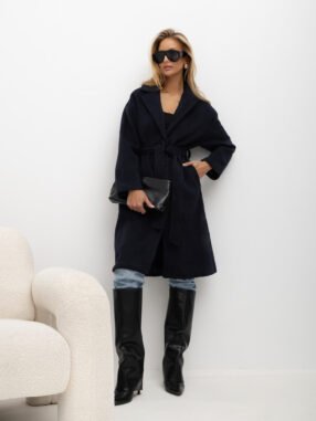 Navy blue women's coat with a tied belt