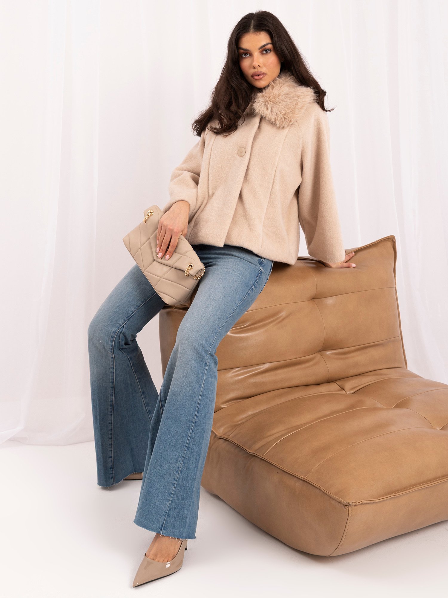 Light beige trapeze coat with button closure
